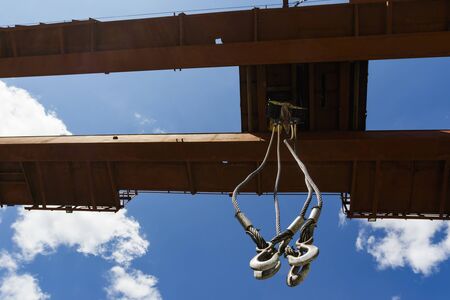 Old crane against the sky.