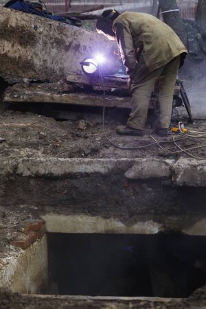 Gas welding machine at work.