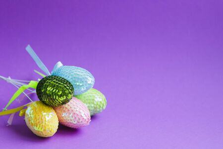 Decorative easter eggs on a colored background.