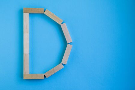 Letter made of natural material on the background