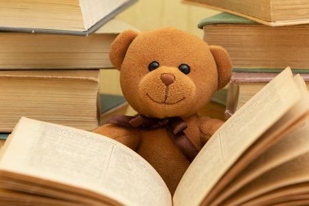 Funny teddy bear with books.の写真素材