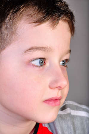 Portrait of a happy boy with an open viewの写真素材