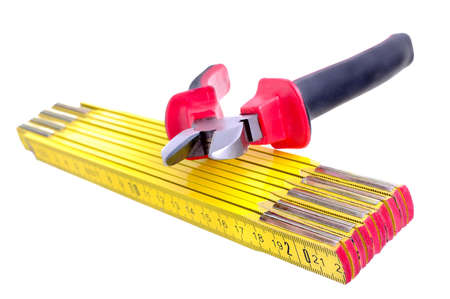 Pliers and meter on the white background