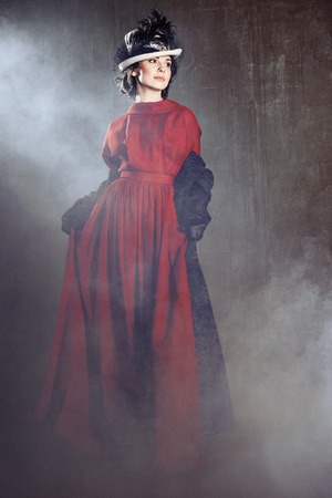 Young woman in in the fotg at retro syleの写真素材