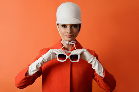 Beautiful girl at the classic image of 60sの写真素材