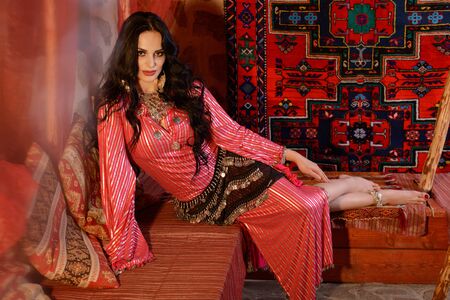 Young girl in traditional arabic dancing costumeの写真素材