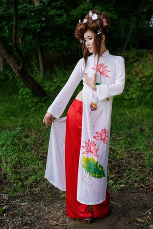 Young beautiful Asian girl in traditionan costumeの写真素材