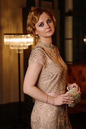 Portrait of young woman in art-deco style