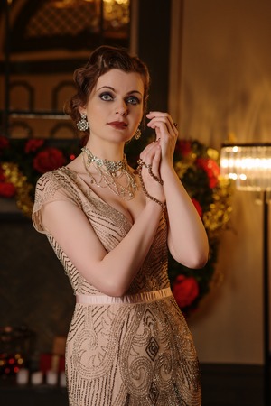 Portrait of young woman in art-deco style