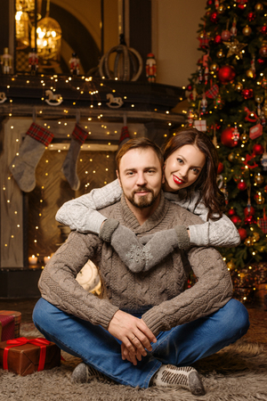 Couple in love is waiting for Christmasの写真素材