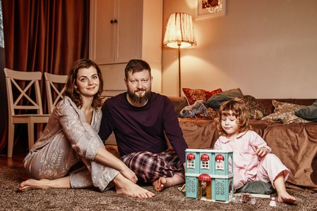 Happy family is waiting for Christmasの写真素材