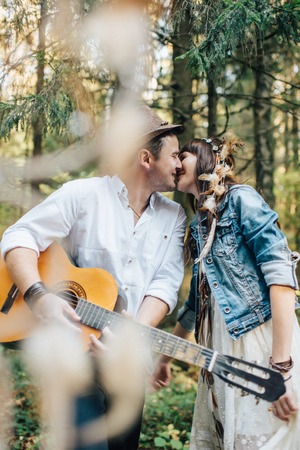 Love story of young couple at natureの写真素材