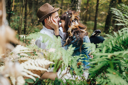 Love story of young couple at natureの写真素材