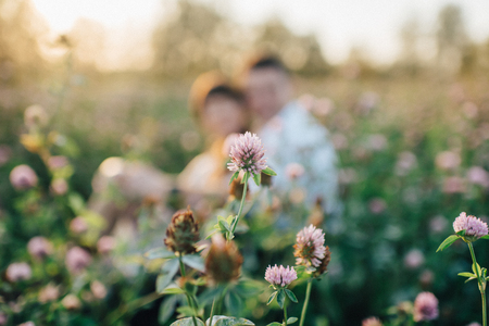 Love story of young couple at natureの写真素材