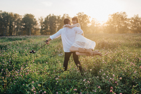 Love story of young couple at natureの写真素材