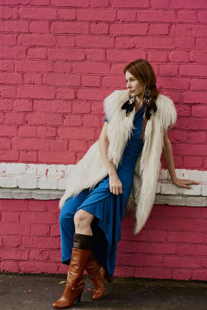 Pretty woman wearing bright dress