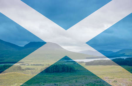 Scotland, UK as travel destination concept. Wild beautiful green lush highland nature in Scotland. With transparent Scottish flag, composite photo.の写真素材