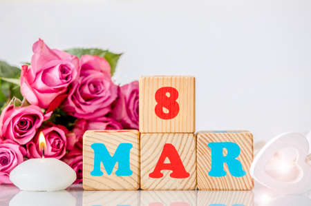 International Women's Day calendar greeting card background. With wood heart, relaxing candle...