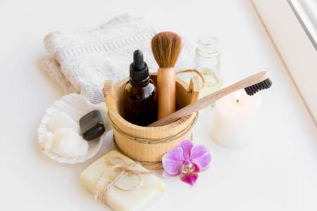 Using natural material products in home, different cosmetic products in bathroom. Minimizing...