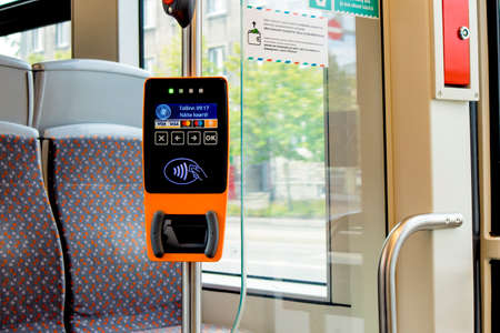 Tallinn, Harjumaa/ Estonia-13JUL2019: QRâ€“ticket or contactless smartcard payment validator...