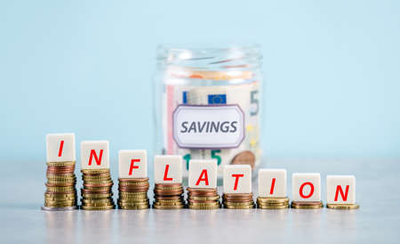 Concept of inflation eating life savings.