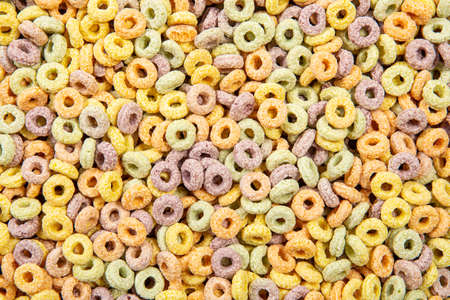 Multi color breakfast round cereal food background.の写真素材