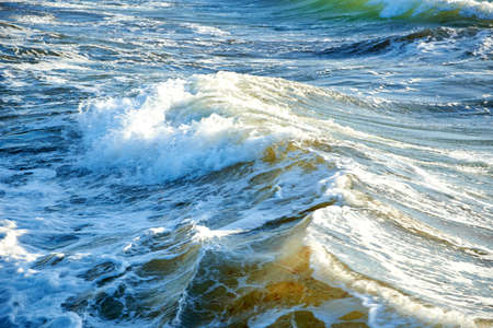 blue green water in stormy seaの写真素材