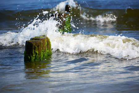 breakwater in action at baltic seaの写真素材