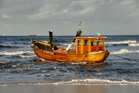 fisher boat on beach of isle Usedom in Germany