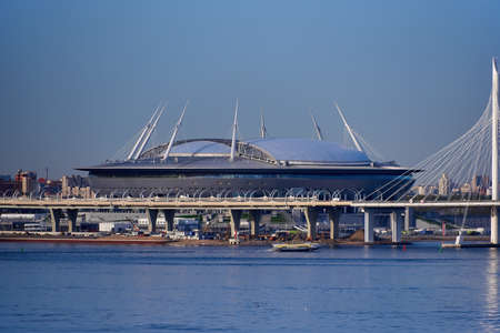 Saint Petersburg, Russia - May-11-2018: Gazprom arena soccer stadium seen from baltic sea in the eveningのeditorial素材