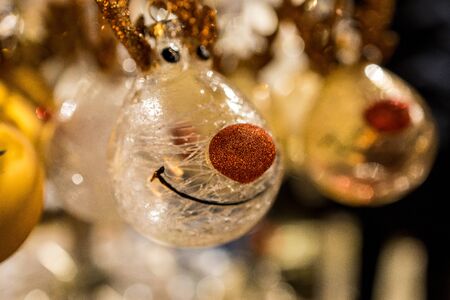 Christmas tree ball with red nose and smiling face.の写真素材
