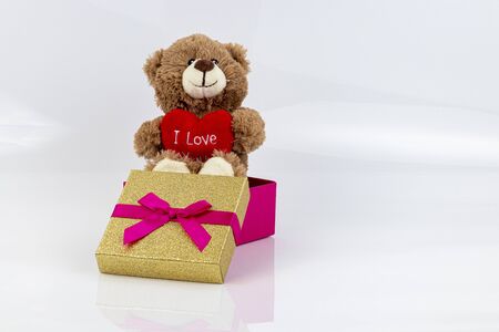 Stuffed bear with a heart and the words "I love you"の写真素材