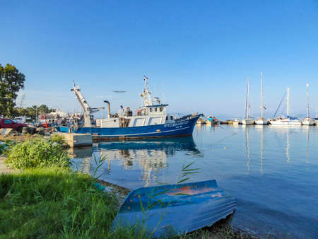 Fishing boat in the port in Greeceのeditorial素材