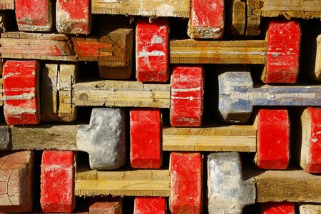Wooden formwork beams were stacked on a pileの写真素材