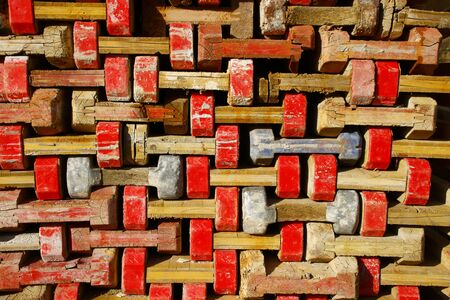 Wooden formwork beams were stacked on a pileの写真素材