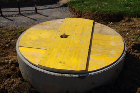 The manhole was provisionally covered with a wooden cover