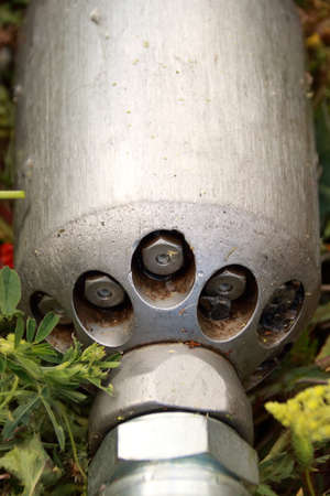 Nozzle for cleaning sewers in a meadow