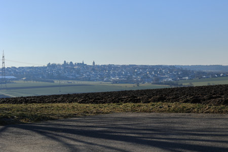 View over meadows and fields to the city of Nussdorfの写真素材