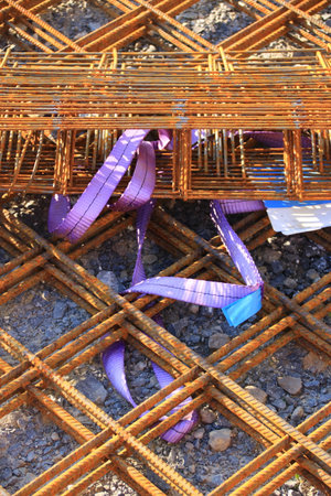 Structural steel was unloaded with a lifting beltの写真素材