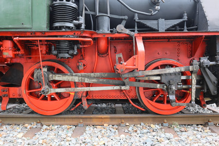 Close-up of the wheels of a steam locomotive