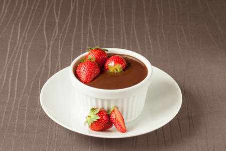 Chocolate mousse with strawberriesの写真素材