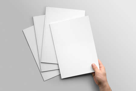 Blank A4 photorealistic mockup brochure on light gray background.の写真素材