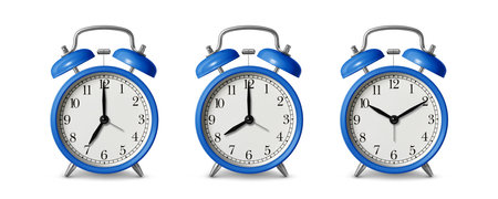 Blue twin bell alarm clock, analog classic vintage retro style alarm clock, isolated on a white...