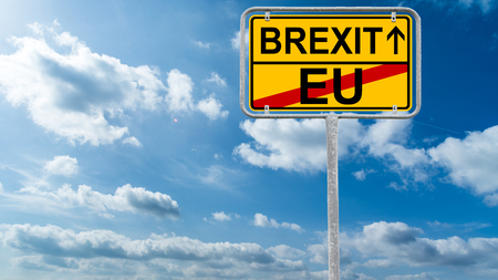 Brexit - Road Sign United Kingdom, European Union - With Sky And Clouds In Backgroundの写真素材