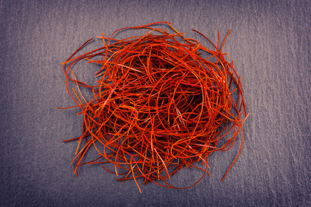 Heap Of Red Chili Threads On Gray Slate  Background