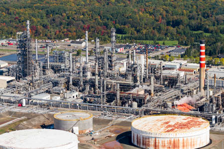 Aerial view of a petro-chemical plant and storage resevoirs.のeditorial素材