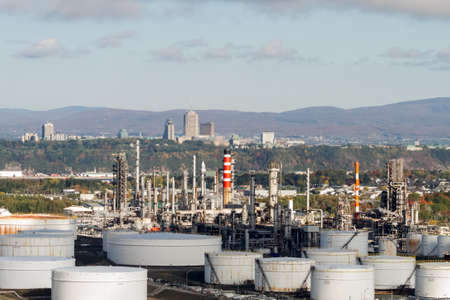 Aerial view of a petro chemical plant, smoke stacks and reservoirs.の写真素材