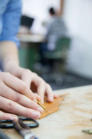 Adult Man Working In A Shoe Factory