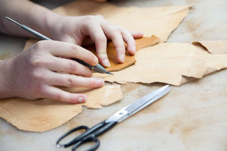 Adult Man Working In A Shoe Factory