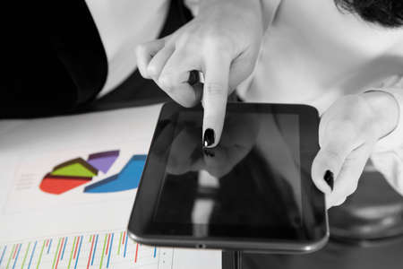 Two beautiful  bussines women with tabletの写真素材